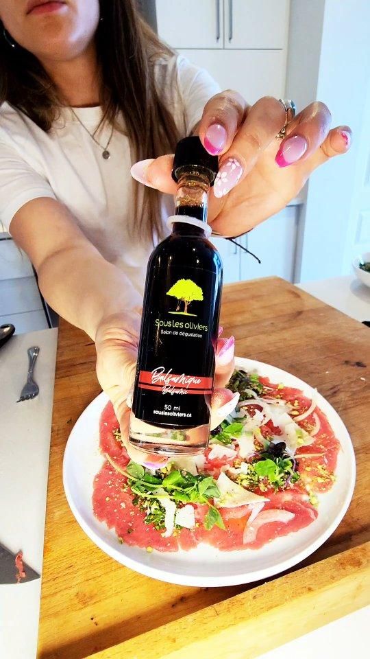 Carpaccio de bar huile de pin